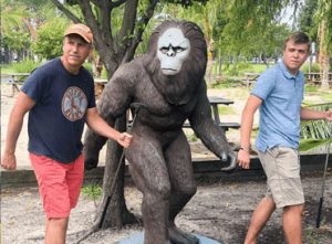 Jon and Joe Brodak on a mini golf course